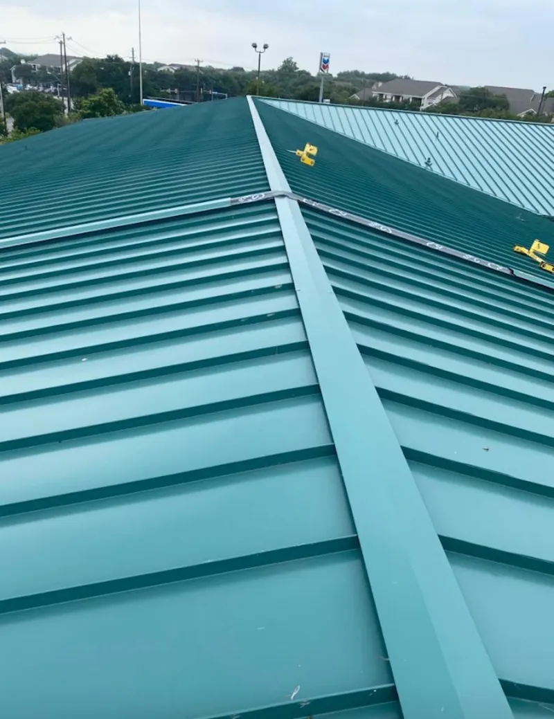 Green commercial metal roof ridge and valley for Metal Roof Repair in Eden Prairie