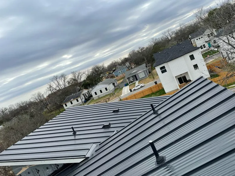 Standing seam metal roof panels with vents for Skylight Repair in Eden Prairie